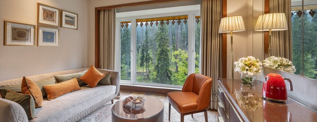 Premier Room at The Khyber Himalayan Resort & Spa in Gulmarg with forest views and luxury interiors.