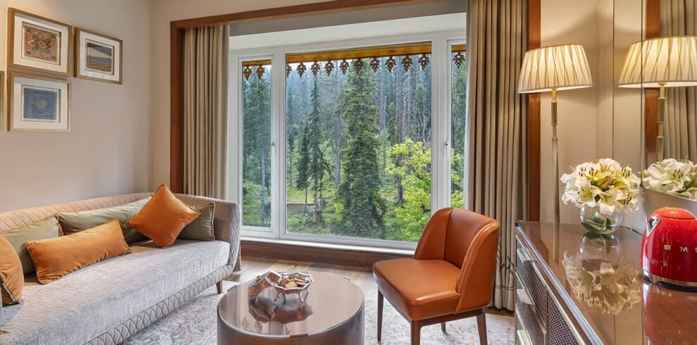 Premier Room at The Khyber Himalayan Resort & Spa in Gulmarg with forest views and luxury interiors.